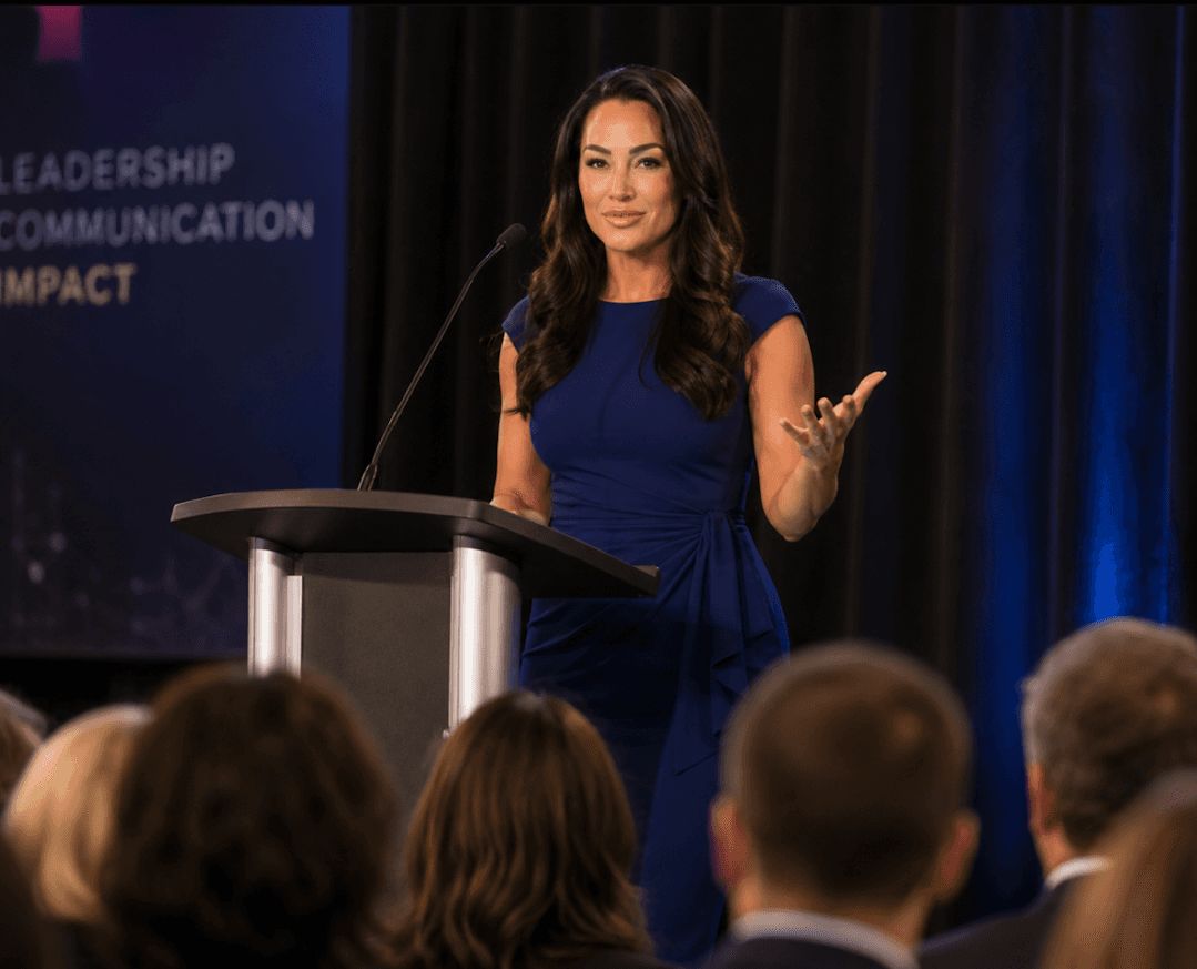 Stacy Paetz speaking at a podium